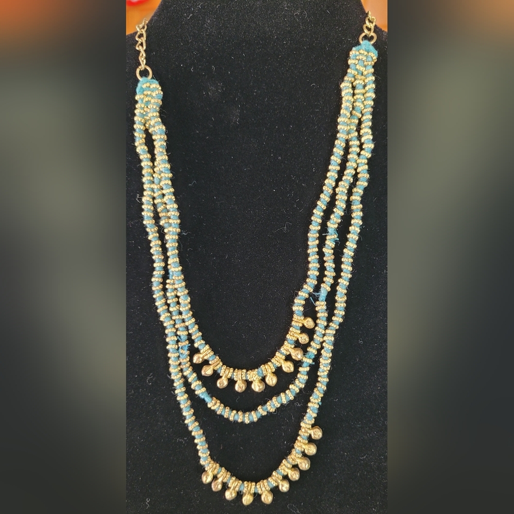 Blue Cord Wrapped In Gold Thread With Gold Bead Necklace